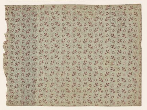 Sheet with scattered pattern of leaf motif and circle on a dotted ground