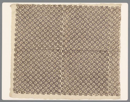 Sheet with scattered pattern of dots on a dot background