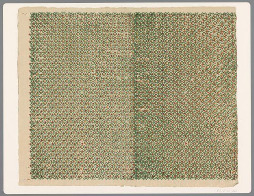 Sheet with grid pattern with cut-out motif with dots and stars