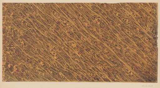 Veined marble flowing diagonally in black and red on yellow paper