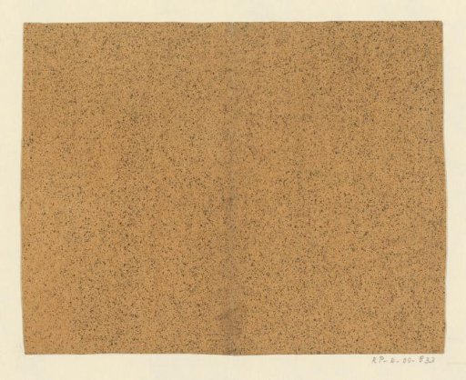 Black speckled yellow-brown paper