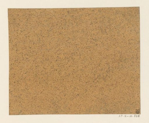 Black speckled yellow-brown paper