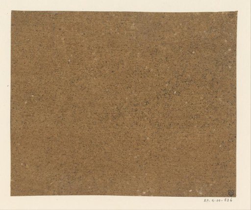 Black speckled brown paper