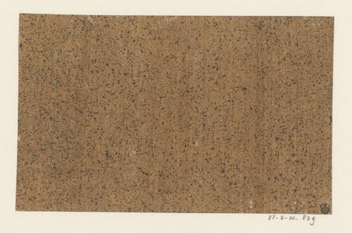 Black speckled brown paper