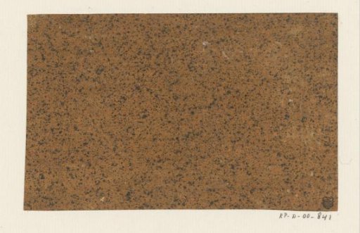 Black speckled brown paper