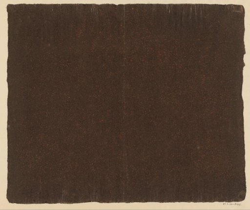 Orange speckled brown paper