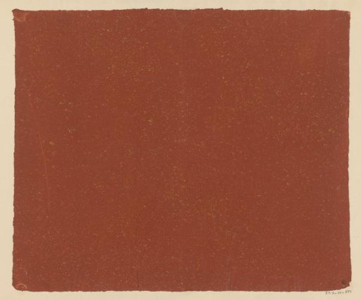 Yellow speckled red paper