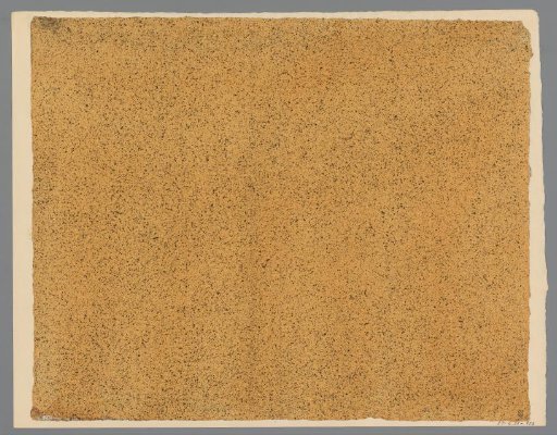 Black speckled yellow-brown paper
