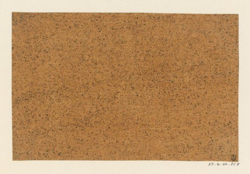 Black speckled yellow-brown paper