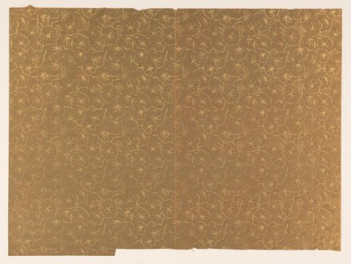 Regular Pattern of Floral Motif on Gold-Coloured Metallic Paper