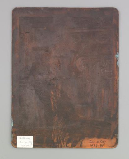 Woman at a table by the fireplace