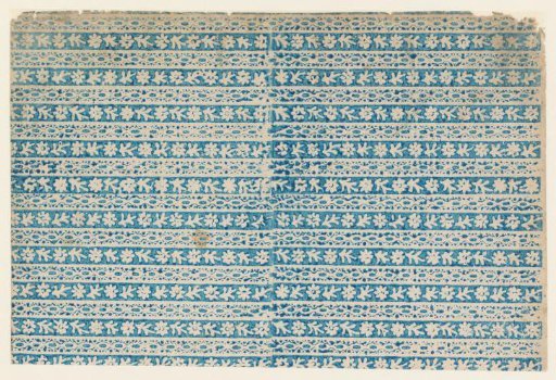 Sheet with a band pattern of reserved flowers and ornamental border