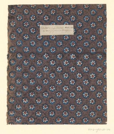 Tile with all-over pattern of cut-out flower motif