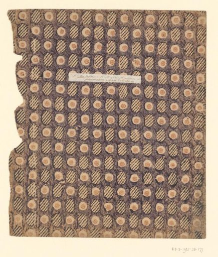 Sheet with an alternating scatter pattern of a cut-out round motif with a dot and an oval motif with a grid