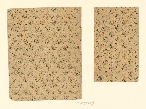 Two sheets with a scattered pattern of a flower branch on a dotted ground