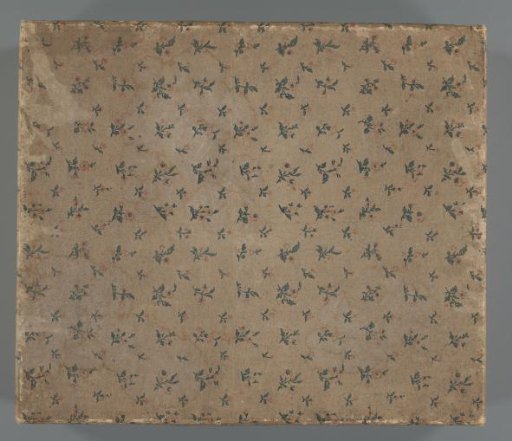 Box covered with chintz paper with a scattered pattern of flowers