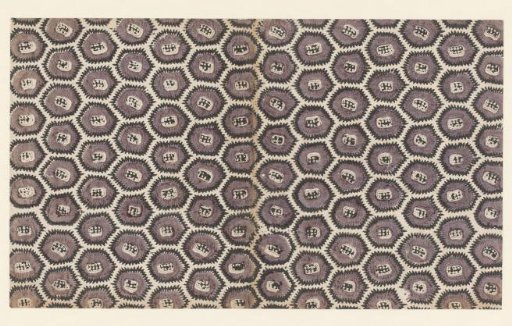 Sheet with a scattered pattern of scalloped hexagonal motifs
