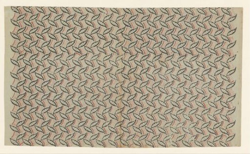 Sheet with an alternating scattered pattern of leaves and striped blocks