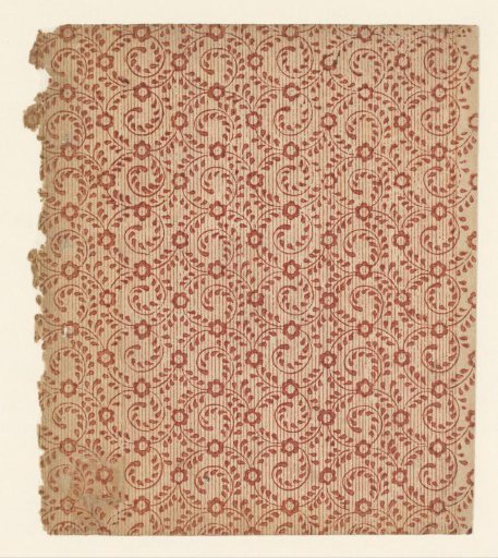 Sheet with pattern of curling vines on continuous line background