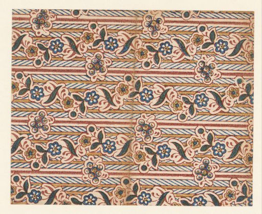 Sheet with striped pattern of scrolling flower vines