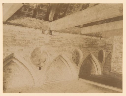 Arched windows and niches in the abbey church at Aduard