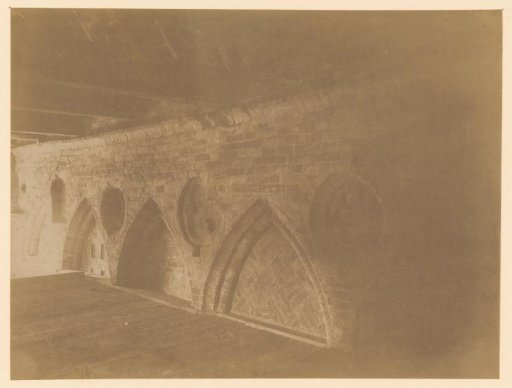 Arched windows and niches in the abbey church at Aduard