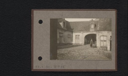 Two women in a courtyard