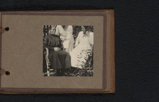 Three women in a garden