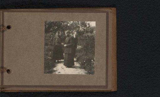 Three Persons in a Garden