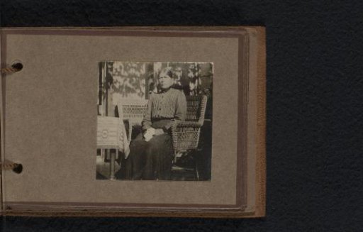 Portrait of a woman in a garden chair