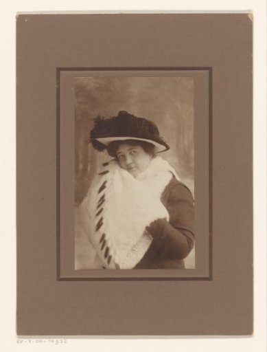 Portrait of an unknown woman with a muff