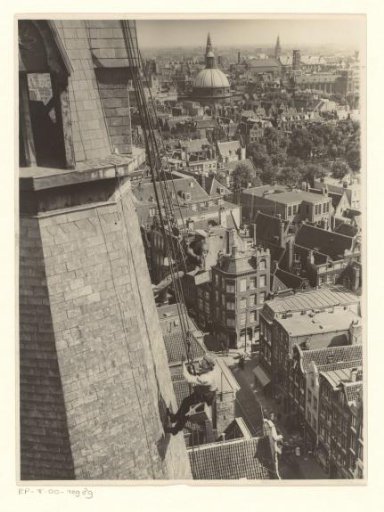 Two men on the tower of the Posthoorn Church on the Haarlemmerstraat