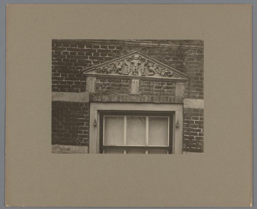 Tympanum with angel and owls at Schelluinen