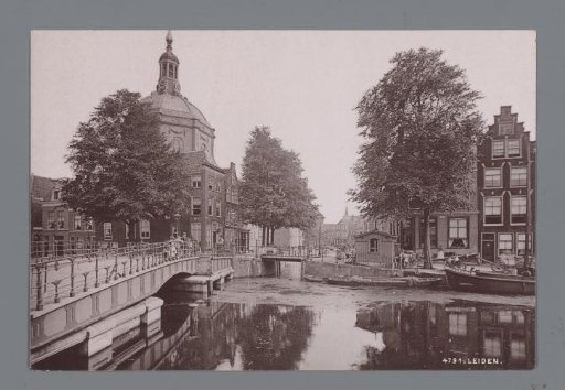 Street view in Leiden with the Marekerk and the Oude Vest