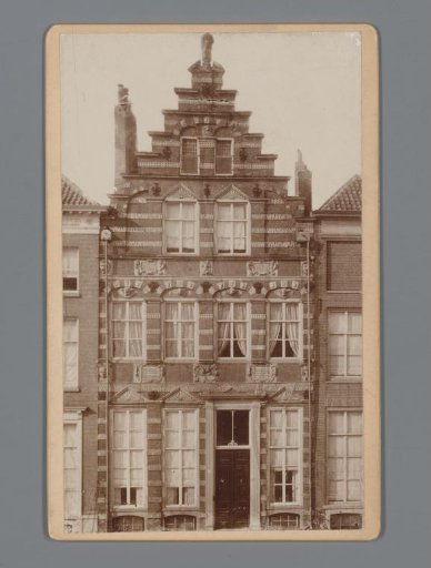 Facade of a Building with a Brick Step Gable and Stone Decoration in Zutphen