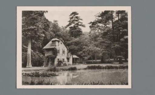 Mill in the Hameau de la Reine in the French gardens of the Palace of Versailles