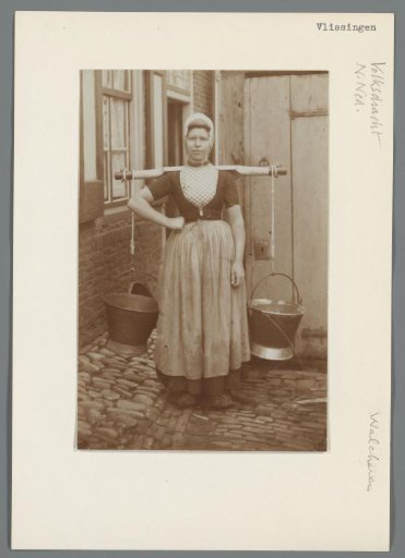 Woman in Walcheren costume with a yoke and two buckets