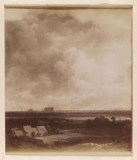 Photographic reproduction of the painting with a view of Haarlem from the northwest, with the bleaching grounds in the foreground, by Jacob van Ruisdael