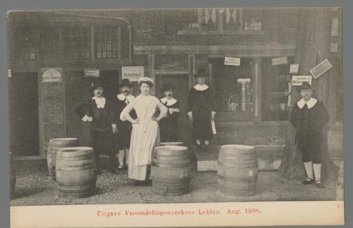 People in costume for a café during the Old Holland Festivals in Leiden
