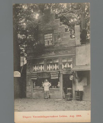 Woman in costume for a shop during the Old Holland Festivals in Leiden