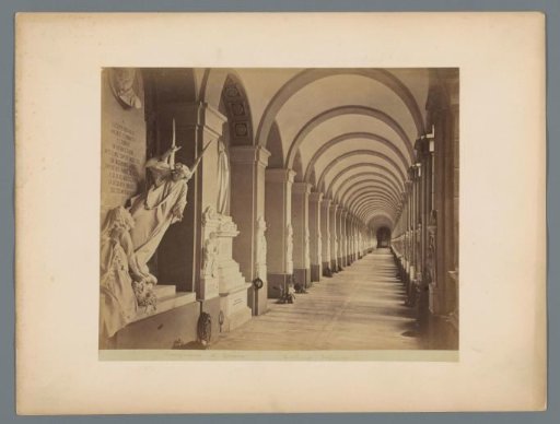 Funeral monuments in a gallery in the Camposanto in Genoa, Italy