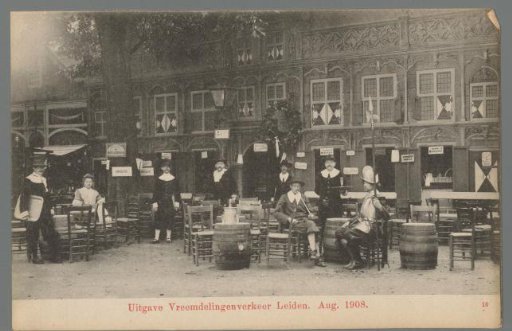 People in costume for a café during the Old Holland Festivals in Leiden