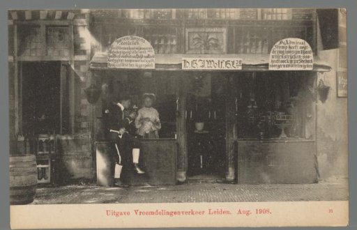People in costume for a shop during the Old Holland Festivals in Leiden
