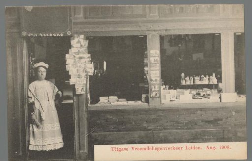 Woman in costume for a shop during the Old Holland festivities in Leiden