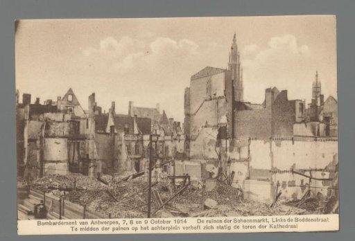 The Ruins of the Schoenmarkt, with the Beddenstraat on the left. Amidst the rubble in the rear courtyard stands proudly the tower of the Cathedral