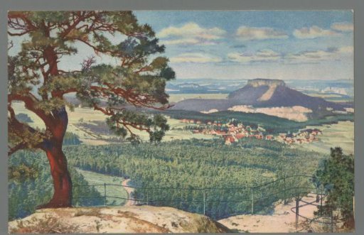 View of a village and rock formation in the Saxon Switzerland