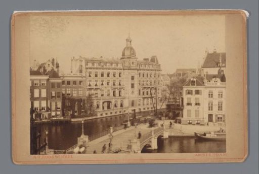 View of the Doelen Hotel with the Amstel in Amsterdam