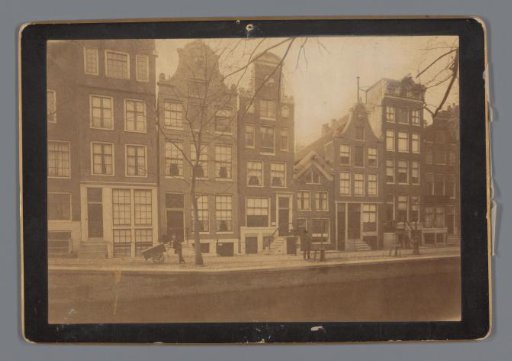 View of houses along a canal in Amsterdam