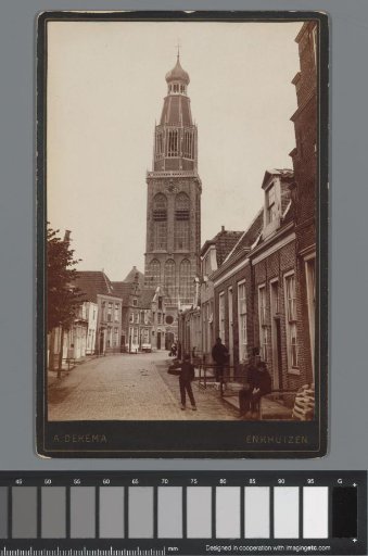 Street view with the tower of the Zuiderkerk in Enkhuizen