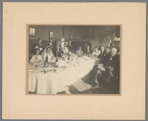 Group portrait of the Jonker family at a wedding feast